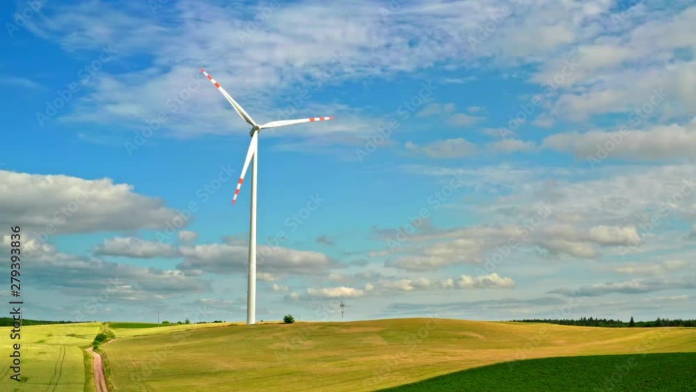 Wind turbines on green field in summer Poland, view from above Wind turbines on green field in summer Poland, view from above