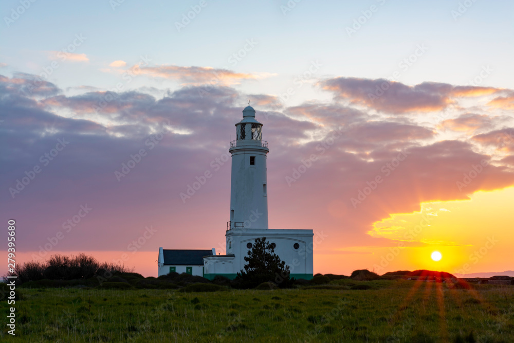 Hurst Point Lighthouse during sunrise Hurst Point Lighthouse during sunrise