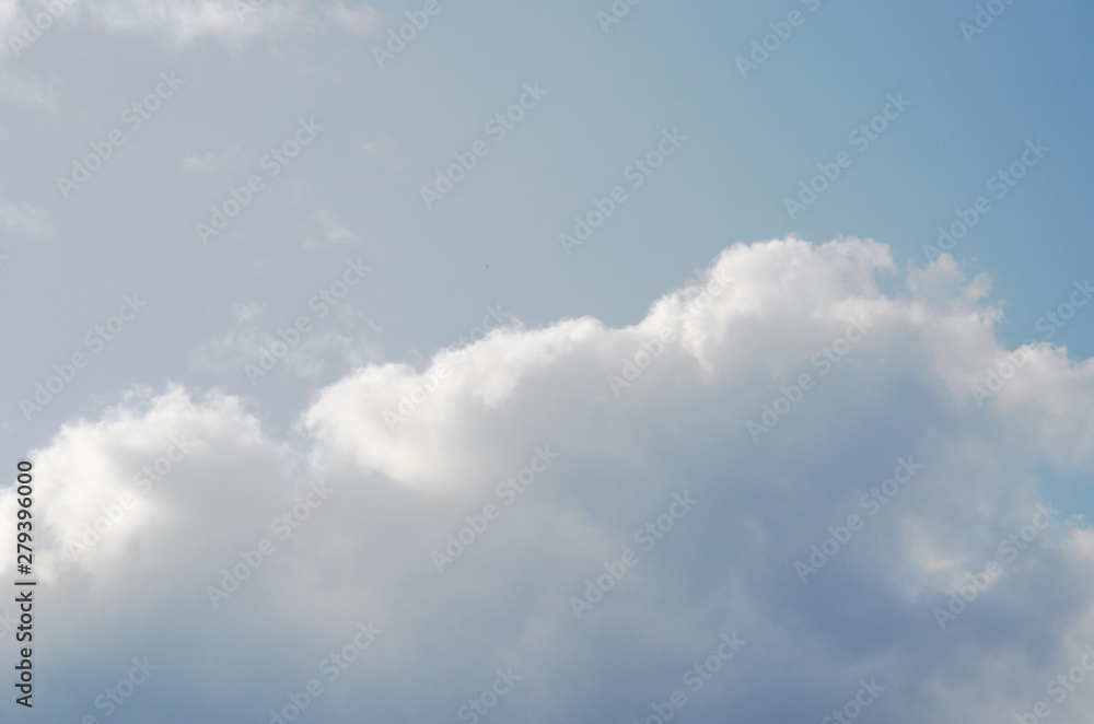 Fototapeta premium Blue sky with white clouds. Heavenly clear background.