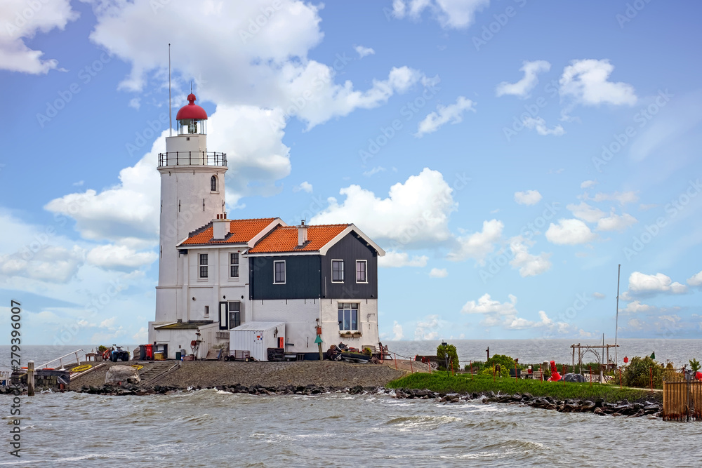 Traditional lighthouse 'Het Paard van Marken' in Marken the Netherlands Traditional lighthouse 'Het Paard van Marken' in Marken the Netherlands