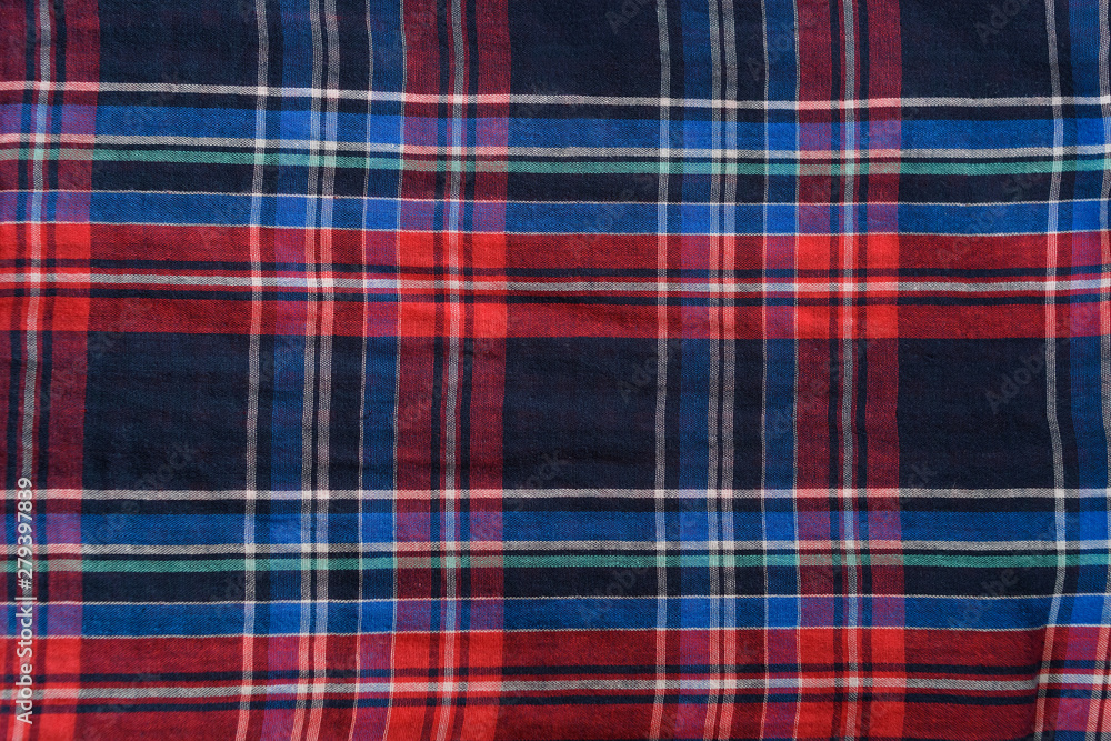 Blue with red checkered seamless fabric. Textural background Blue with red checkered seamless fabric. Textural background