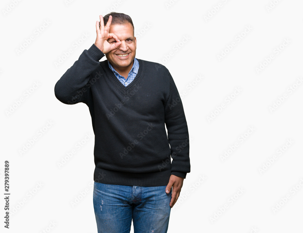 Handsome middle age man over isolated background doing ok gesture with hand smiling, eye looking through fingers with happy face. Handsome middle age man over isolated background doing ok gesture with hand smiling, eye looking through fingers with happy face.