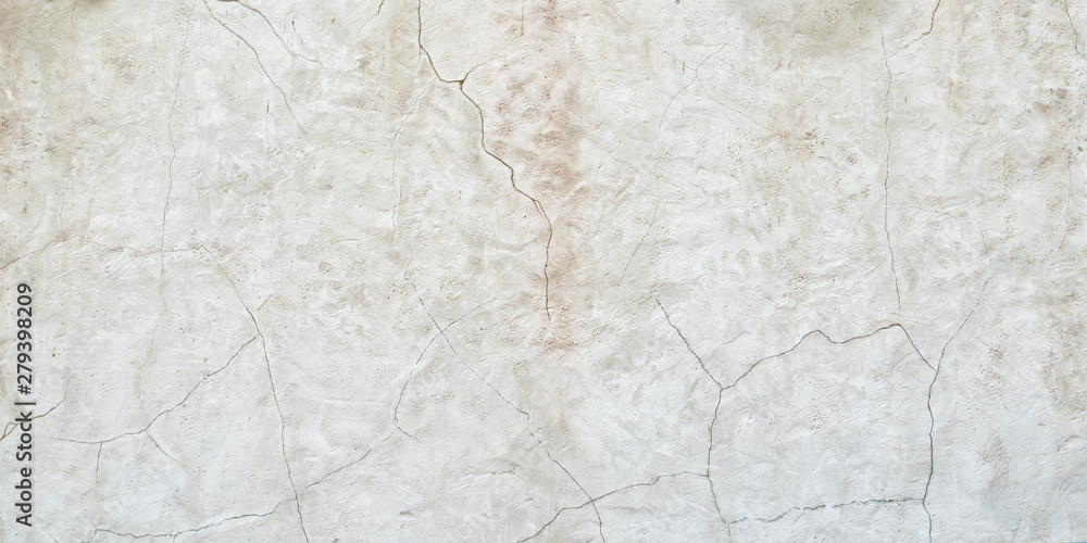Old gray wall with cracks on the plaster. Abstract background Old gray wall with cracks on the plaster. Abstract background