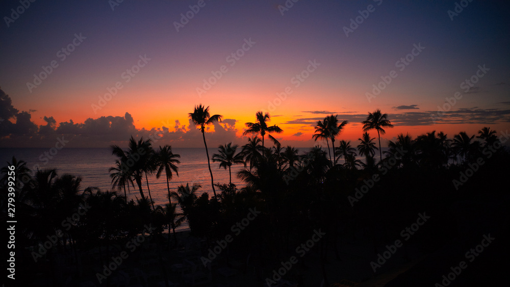 aerial view of a beautiful caribbean sunset at the beach aerial view of a beautiful caribbean sunset at the beach