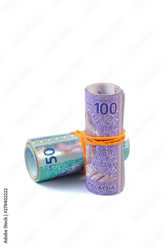 50 and 100 Malaysian Ringgit banknotes tied with rubber-band 50 and 100 Malaysian Ringgit banknotes tied with rubber-band
