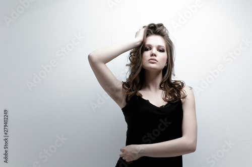 Beautiful girl with perfect skin and long hair, developing