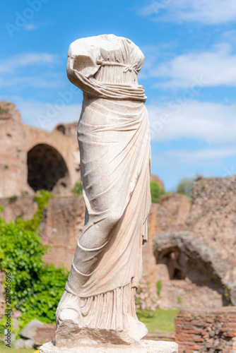 Antique marble headless statue of Vestal Vigin. House of Vestals at Roman Forum, Rome, Italy photo