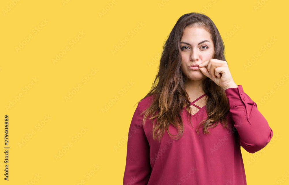 Beautiful plus size young woman over isolated background mouth and lips shut as zip with fingers. Secret and silent, taboo talking Beautiful plus size young woman over isolated background mouth and lips shut as zip with fingers. Secret and silent, taboo talking