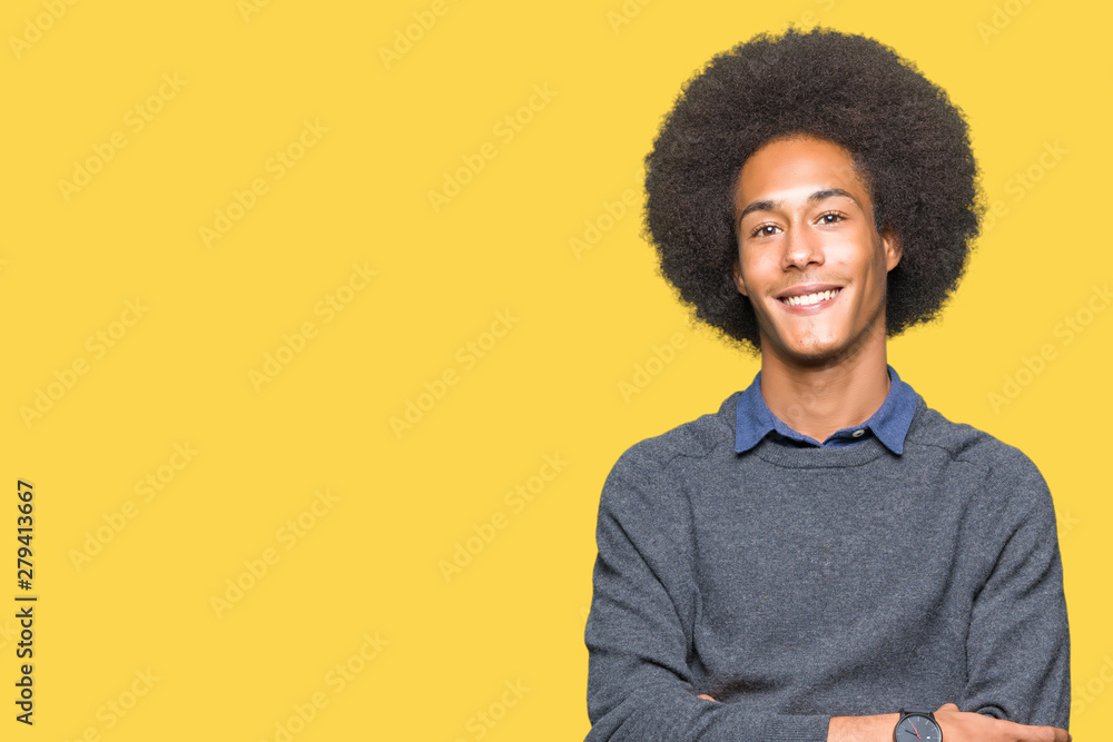 Young african american business man with afro hair happy face smiling with crossed arms looking at the camera. Positive person. Young african american business man with afro hair happy face smiling with crossed arms looking at the camera. Positive person.