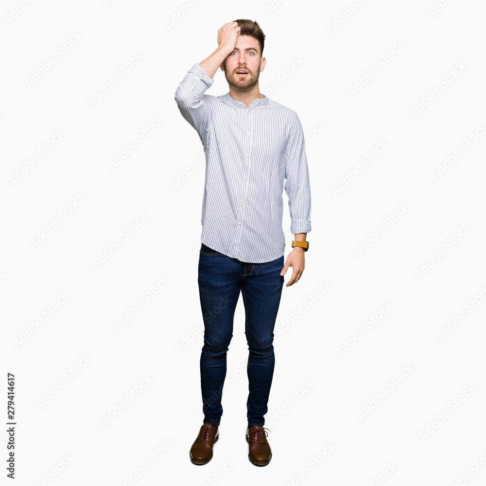 Young handsome man surprised with hand on head for mistake, remember error. Forgot, bad memory concept. Young handsome man surprised with hand on head for mistake, remember error. Forgot, bad memory concept.