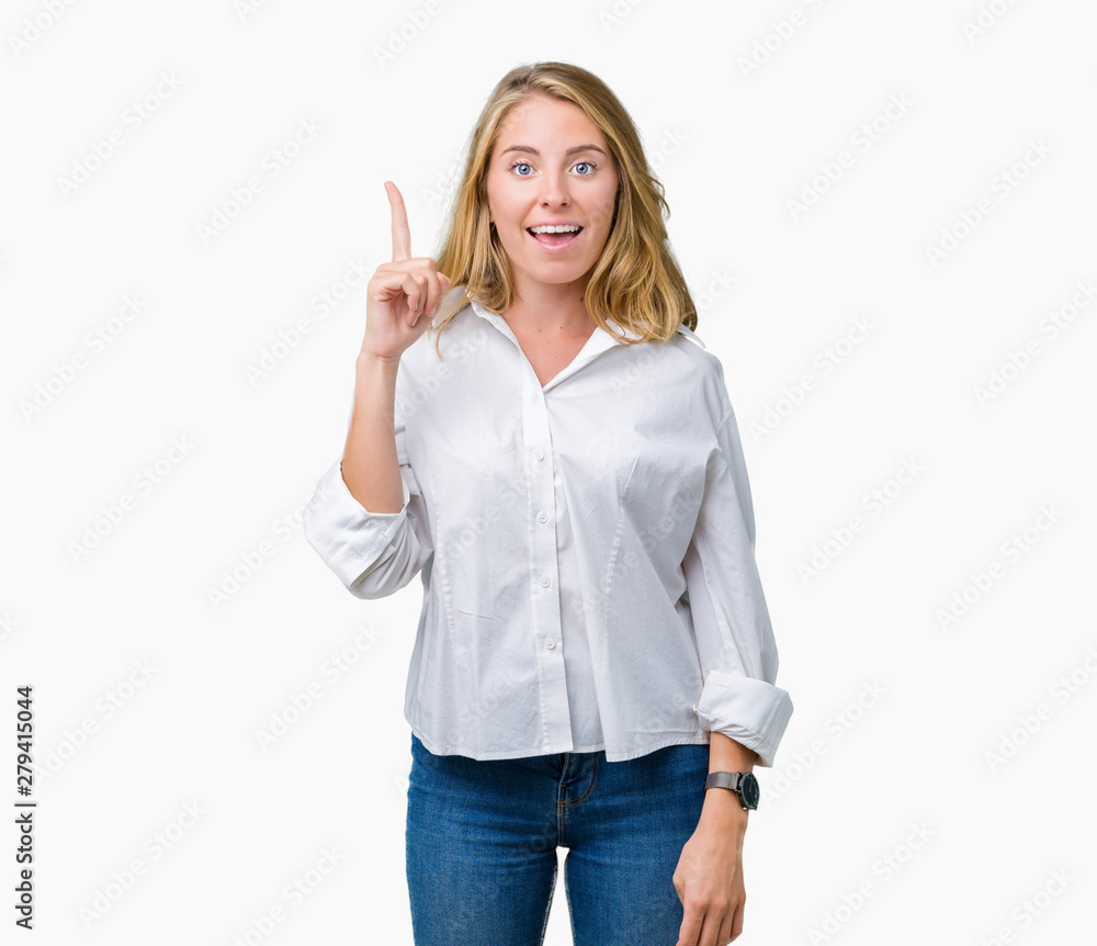 Beautiful young business woman over isolated background pointing finger up with successful idea. Exited and happy. Number one. Beautiful young business woman over isolated background pointing finger up with successful idea. Exited and happy. Number one.
