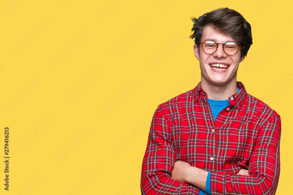 Young handsome man wearing glasses over isolated background happy face smiling with crossed arms looking at the camera. Positive person. Young handsome man wearing glasses over isolated background happy face smiling with crossed arms looking at the camera. Positive person.