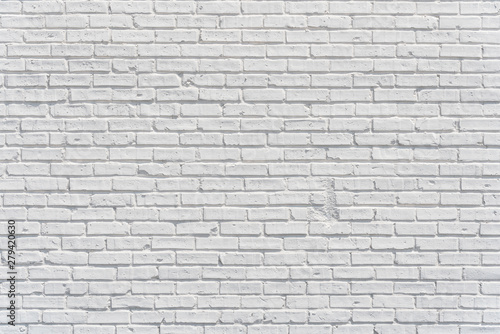 Brick white wall with shadows  texture or background
