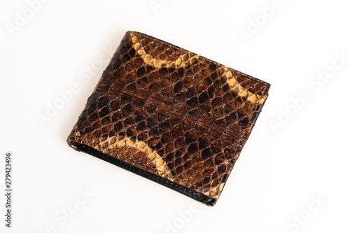 Brown Python leather wallet isolated on white background.