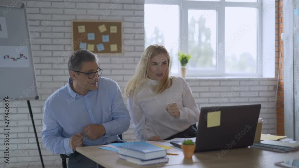 Funny dances. Two successful happy businessmen are having fun and dancing in the office. celebrate success. slow motion. 4K Funny dances. Two successful happy businessmen are having fun and dancing in the office. celebrate success. slow motion. 4K
