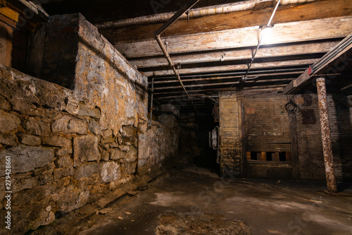 Grungy warehouse basement photo