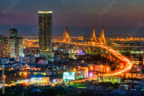 Bangkok city view and Bhumibol Bridge at dusk in Thailand.