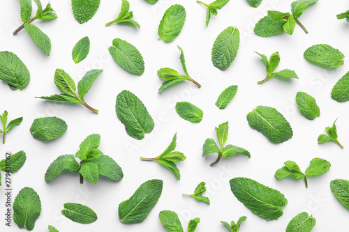 Fresh green mint leaves on white background, top view photo