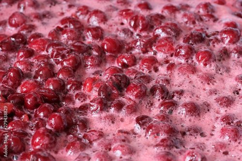 Making cherry jam berries