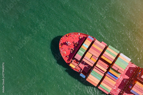 top aerial view of the bulk head of container ship sailing in the sea carriage the shipment from loading port to destination discharging port  transport and logistics services to worldwide