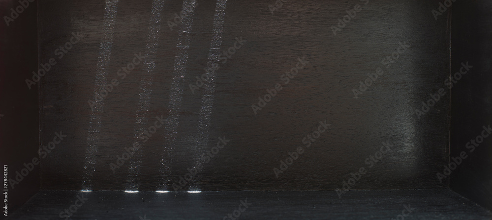 Fototapeta premium Light and shadow in a black room with empty space