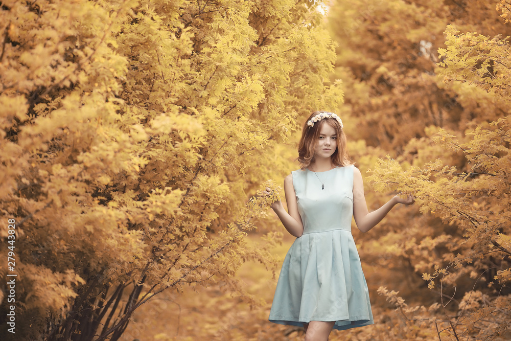 Young girl on a walk in the autumn Young girl on a walk in the autumn