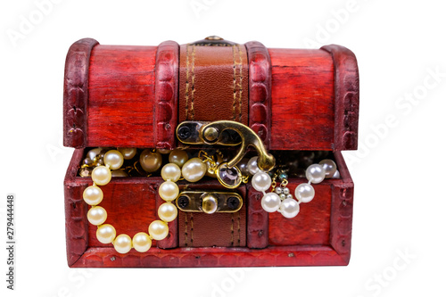Vintage treasure chest full of jewelry and accessories isolated on white background
