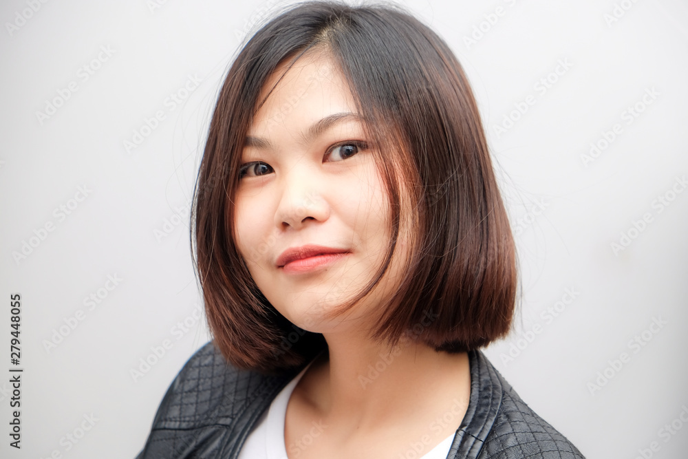 Attractive smiling women wear black leather shirt Attractive smiling women wear black leather shirt