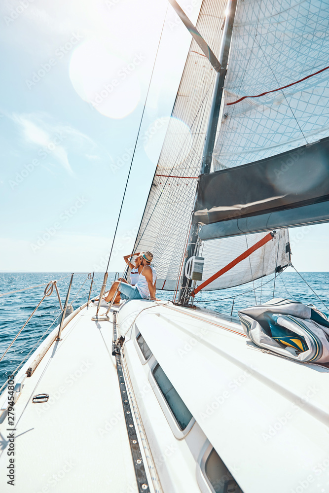 Man and woman in love on a yacht in the summer. Man and woman in love on a yacht in the summer.
