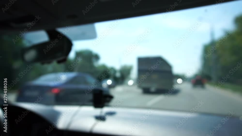 traffic video from inside the car, out of focus, far plan traffic video from inside the car, out of focus, far plan