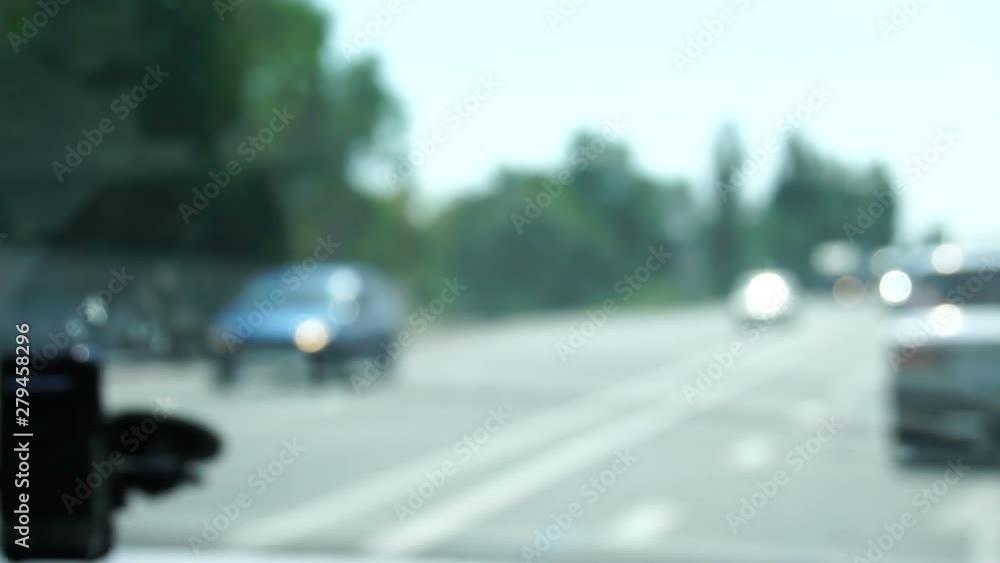 traffic video from inside the car, out of focus, far plan traffic video from inside the car, out of focus, far plan