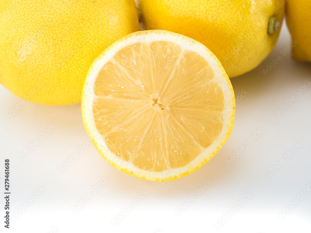 Juicy lemons on a completely white background. Fruits and vitamins. Juicy lemons on a completely white background. Fruits and vitamins.