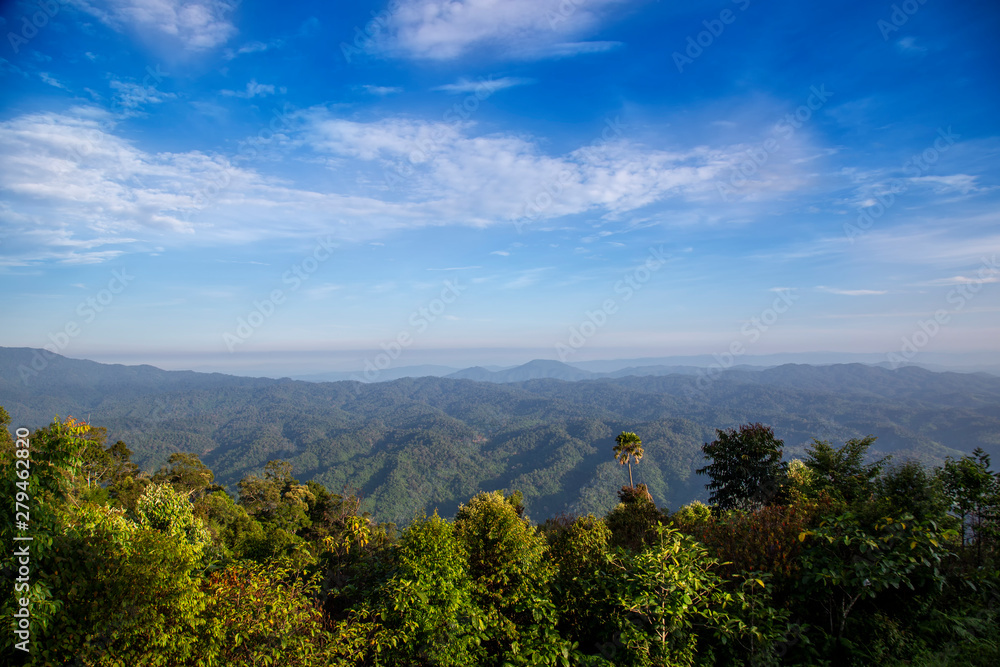 Mountains landscape view in rain forest with blue sky. Beautiful scenery view in countryside of asia.