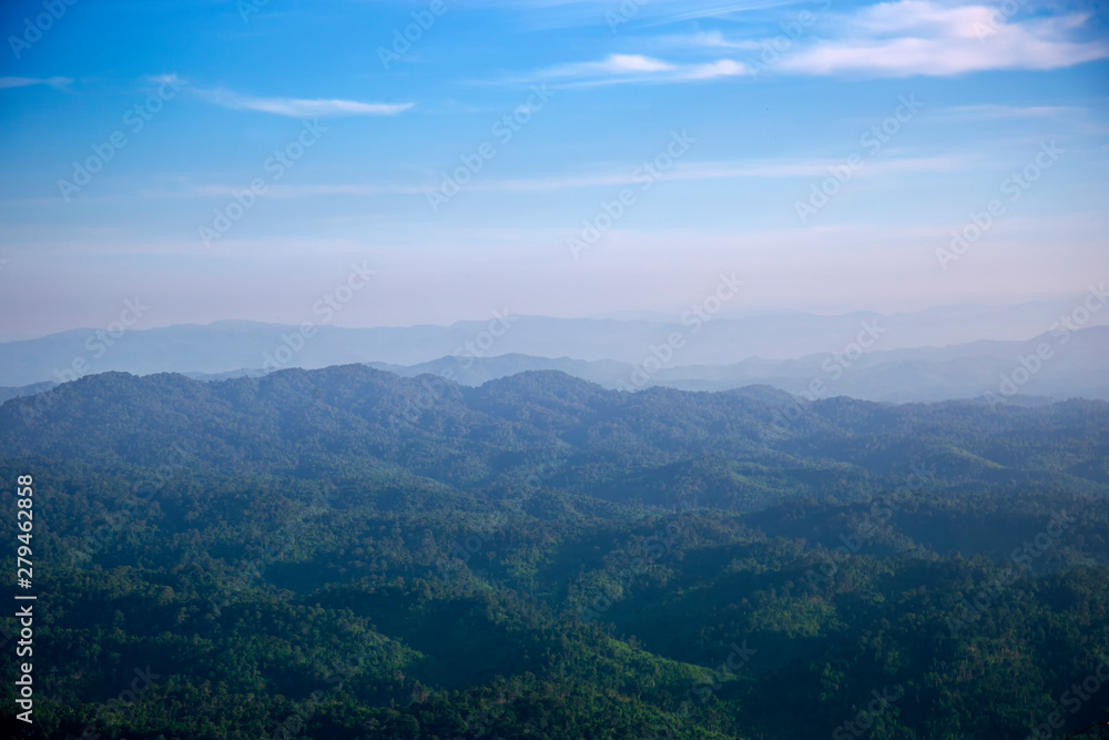 Mountains view landscape in rain forest with blue sky. Beautiful scenery view in countryside of asia. Mountains view landscape in rain forest with blue sky. Beautiful scenery view in countryside of asia.