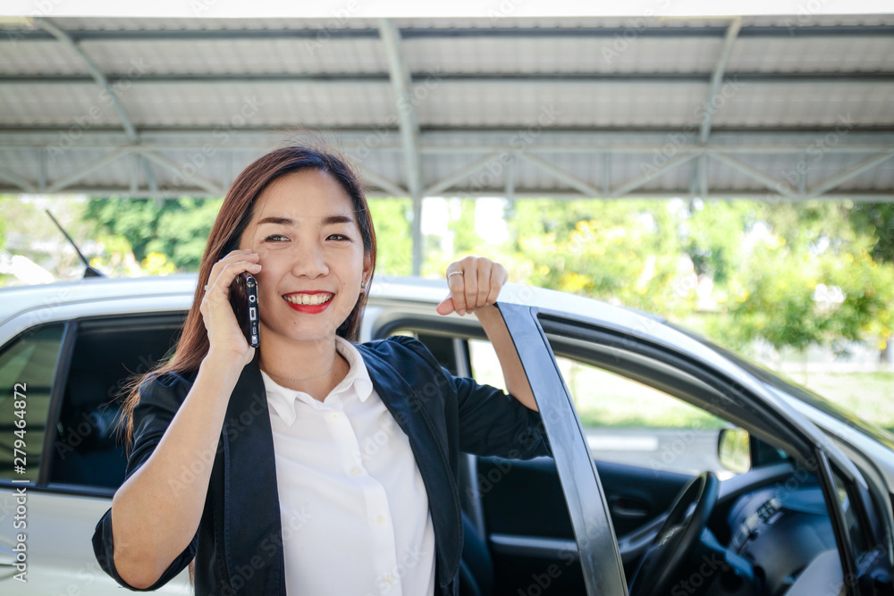Beautiful woman driving to work But her car is broken Calling a repairman Beautiful woman driving to work But her car is broken Calling a repairman