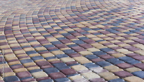 Pavement lined with multicolored tiles
