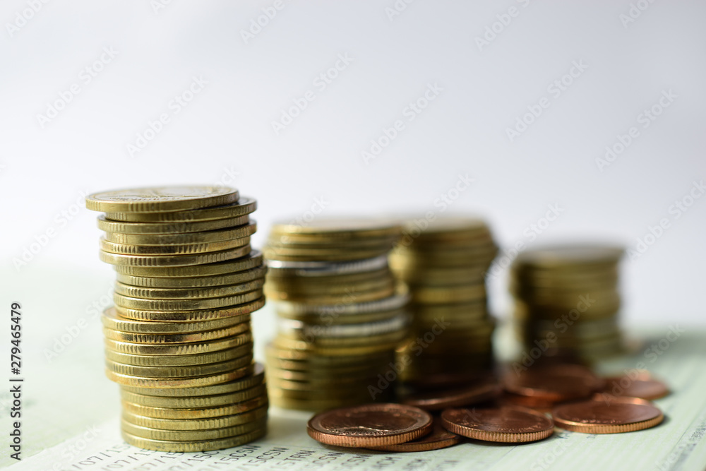 Close up of coins to stack of coins, Business Growth concept. Financial risk. Close up of coins to stack of coins, Business Growth concept. Financial risk.