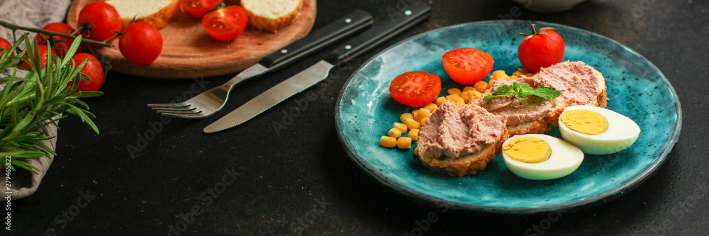 Breakfast snack, tasty food (pate, toast, tomato, corn, egg, coffee). top view. food background Breakfast snack, tasty food (pate, toast, tomato, corn, egg, coffee). top view. food background