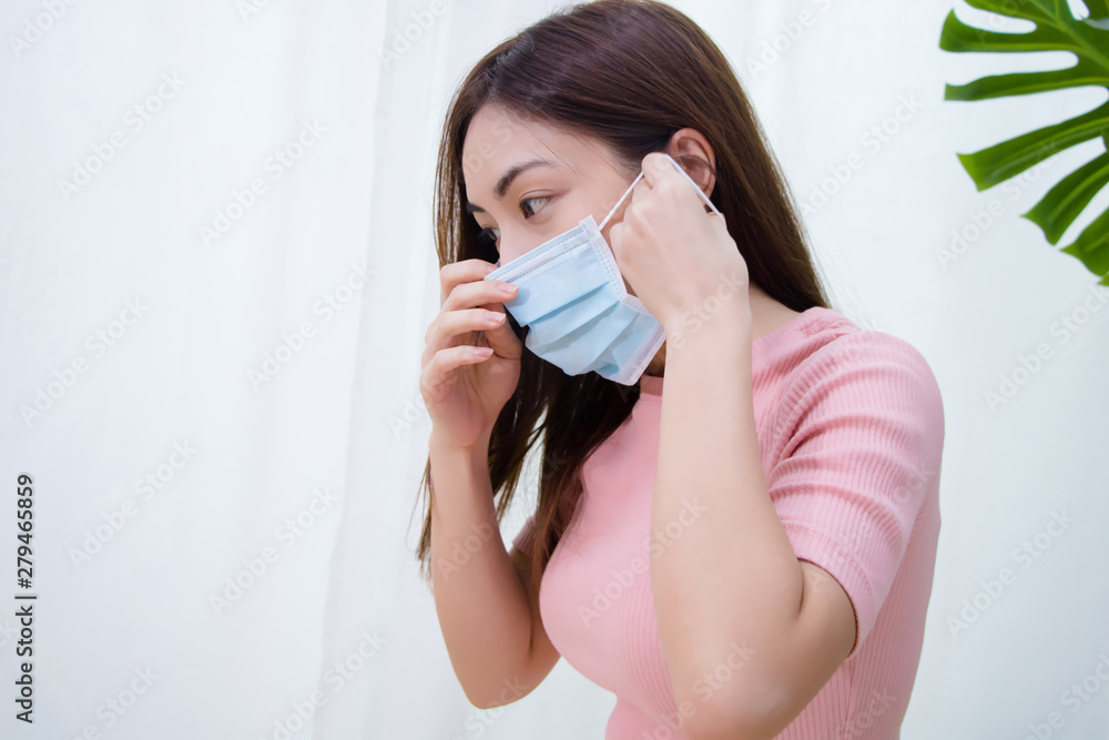 Woman suffer from cough with face mask protection. Woman suffer from cough with face mask protection.