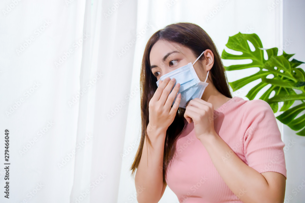 Woman suffer from cough with face mask protection. Woman suffer from cough with face mask protection.