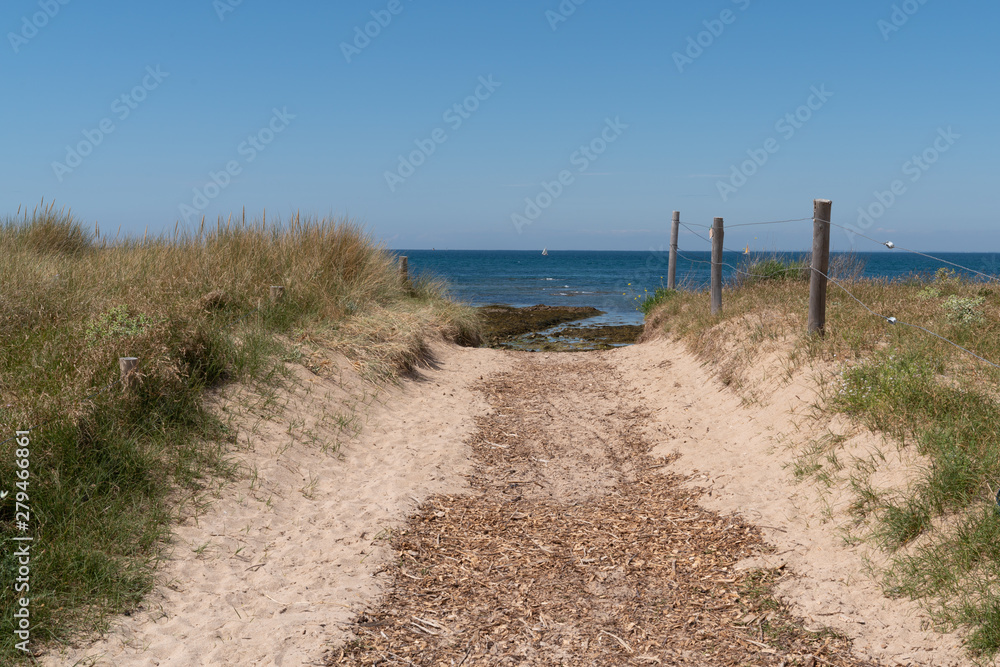 access beach of isle Noirmoutier by sand pathway in Vendee France