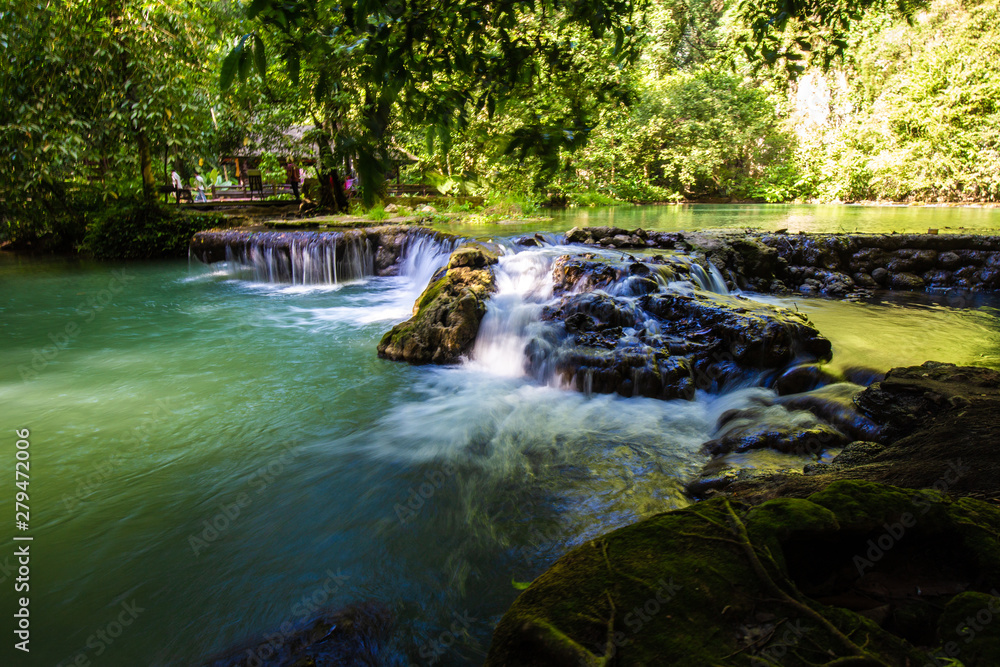 Fototapeta premium Waterfall in deep tropical rain forest Sra Bok Karanee in Phang Nga