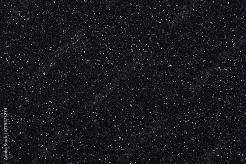 Glitter background, new texture in strict black tone with sparkles. High quality texture in extremely high resolution, 50 megapixels photo.