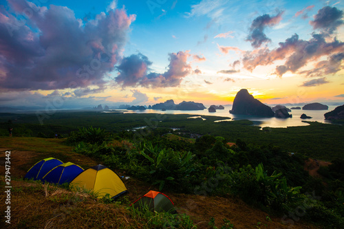 Camping tent on mountain sunrise colorful sky with cloud