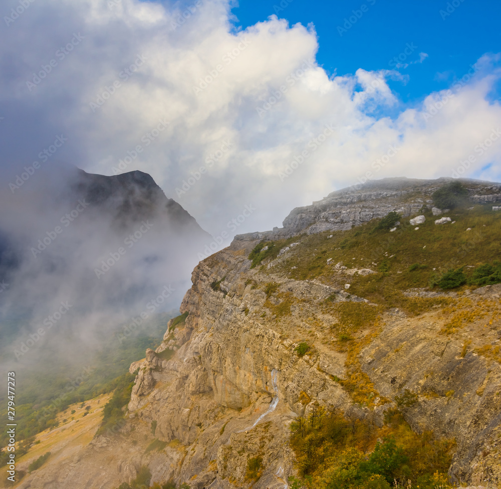 closeup mount top in a dense clouds closeup mount top in a dense clouds