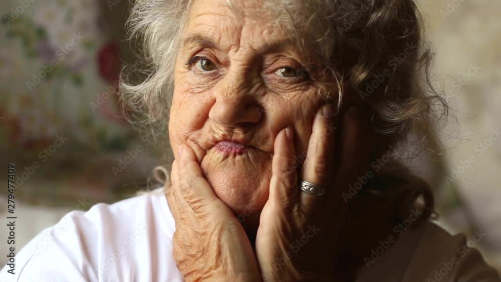 Elderly woman surprised face and opened mouth Elderly woman surprised face and opened mouth