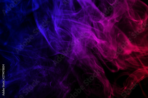 abstract red and blue gradient color smoke as wave line in the dark air on black background