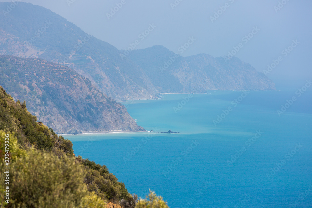 Bright blue sea and coastline mountains Bright blue sea and coastline mountains