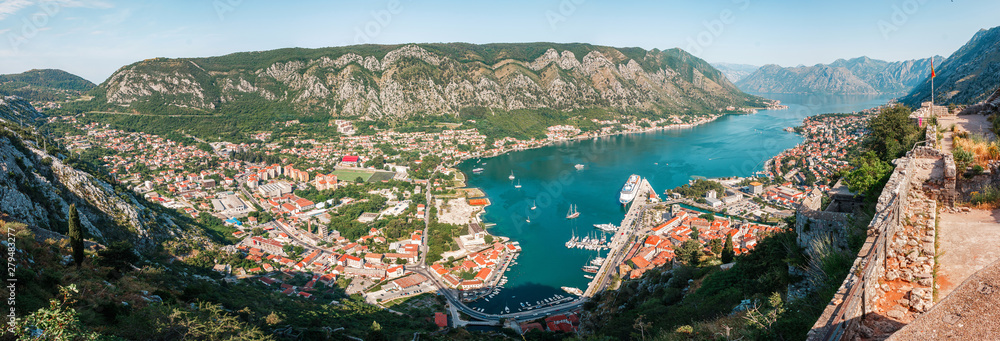 Cityscape of old city Kotor, bay in Adriatic sea surrounded by mountains, Montenegro. Panoramic view from above
