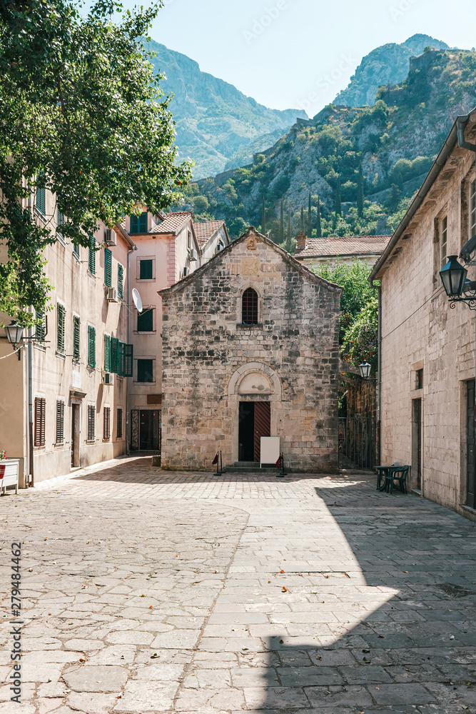 Old historical buildings in the central district of ancient city Kotor in Montenegro